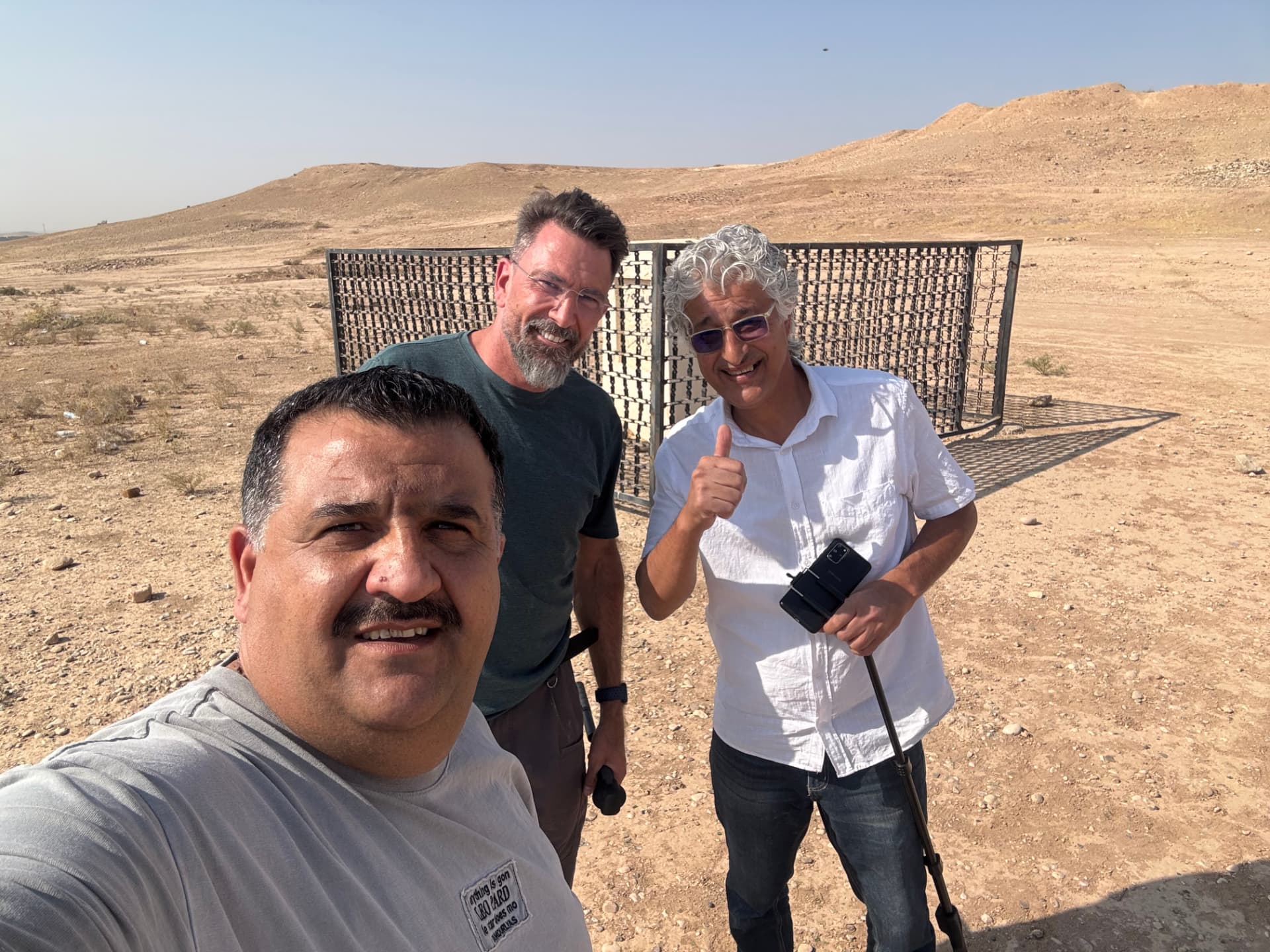 The survey team at the central memorial during the November 2025 visit to Khanaqin.