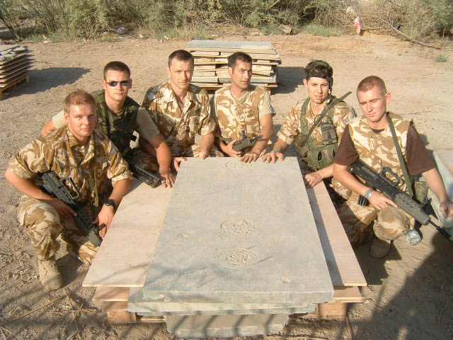 A complete WW1 Memorial Panel showing Regimental Badges with names underneath.