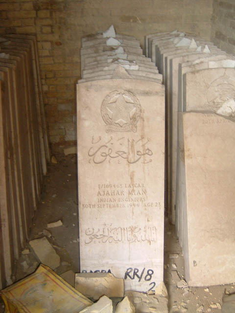 Replacement gravestone of E/169463 Lascar Ajahar Mian, Indian Engineers, died 30 September 1944, age 23, marked "BASRA RR/8". One of the WW2 Indian headstones stored at the cemetery and removed by the British Army in 2003, current whereabouts unknown.