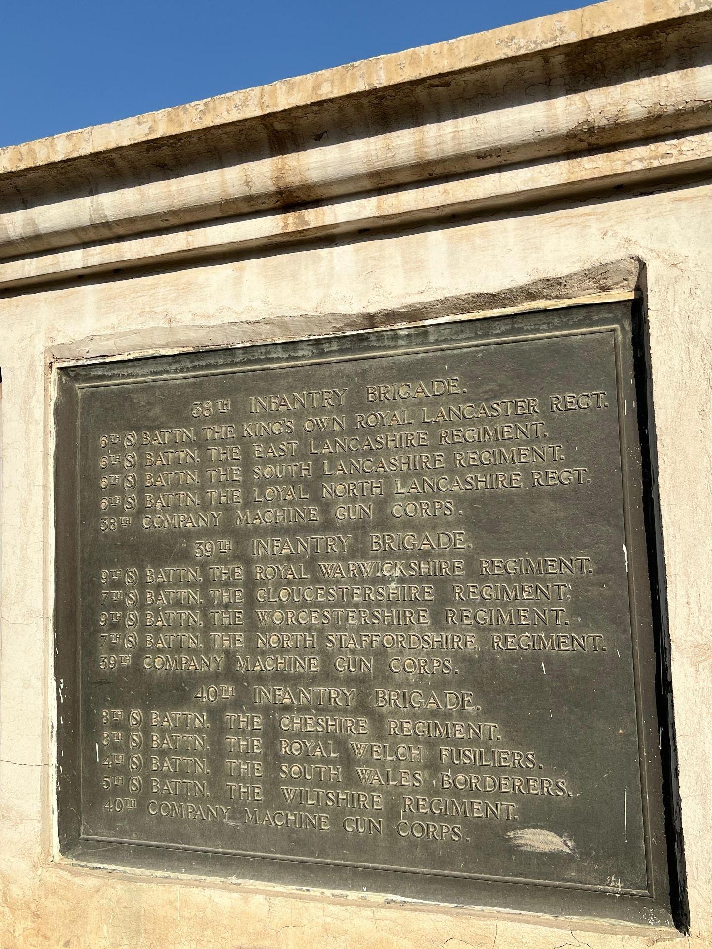 Plaque listing the constituent units of the 13th Division: the 38th, 39th, and 40th Infantry Brigades, including the King's Own Royal Lancaster, East, South and Loyal North Lancashire Regiments, Royal Warwickshire, Gloucestershire, Worcestershire and North Staffordshire Regiments, the Cheshire Regiment, Royal Welch Fusiliers, South Wales Borderers, Wiltshire Regiment, and their respective Machine Gun Corps companies.