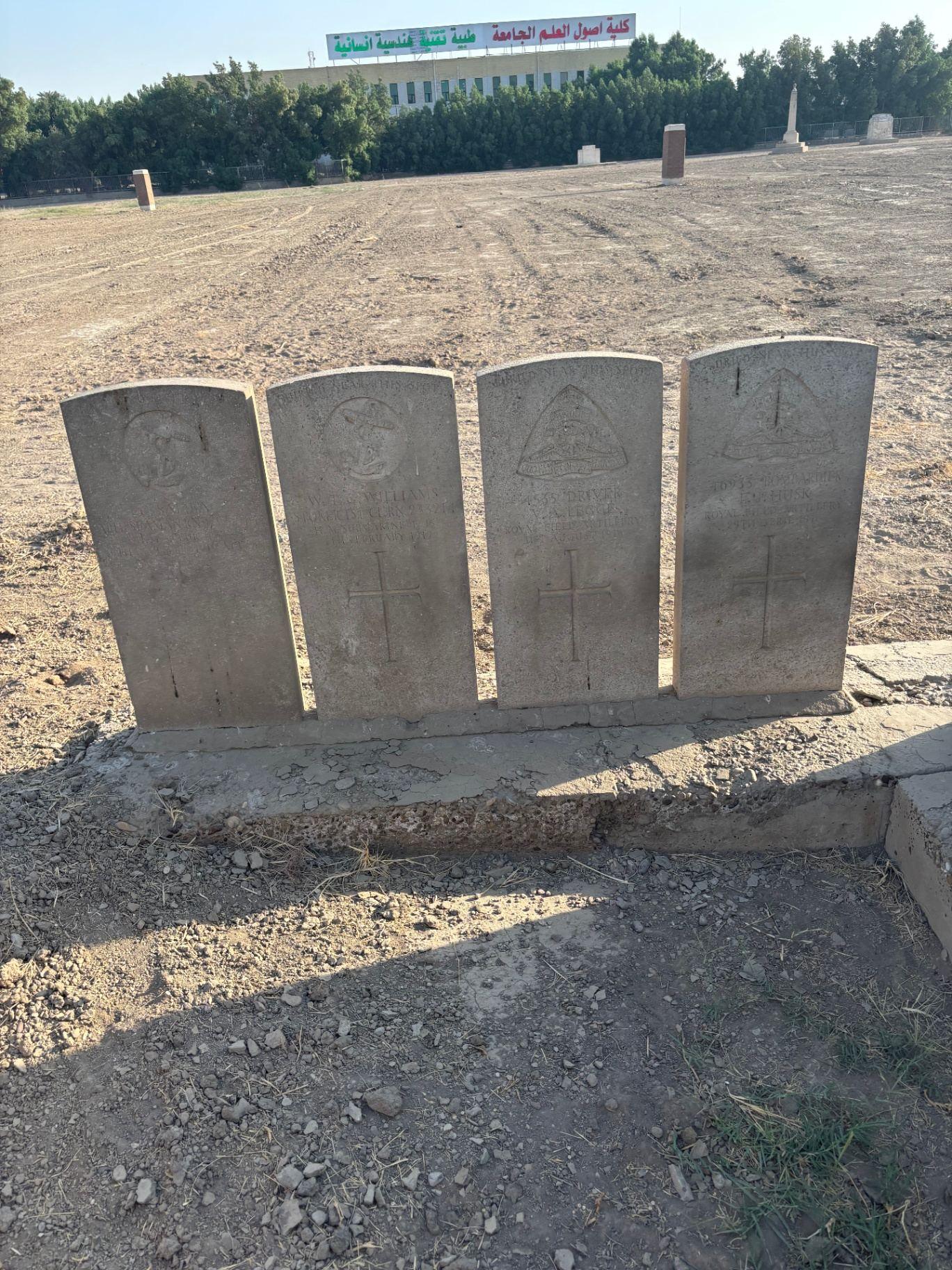Four headstones at Baghdad Northgate Cemetery, including one commemorating a crew member of HM Submarine E15, lost in the Dardanelles in 1915.