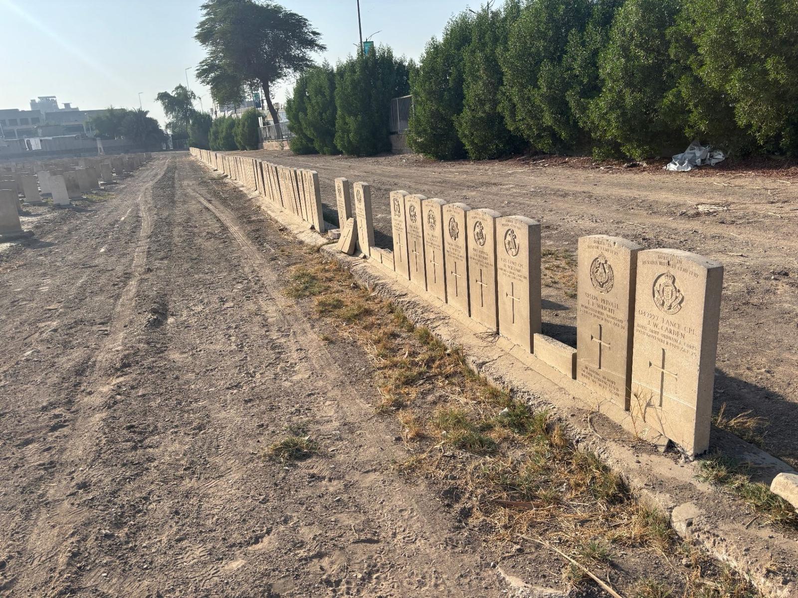 The row of headstone-style memorials at Baghdad Northgate to men who died in Ottoman prisoner of war camps in Turkey, each inscribed with the original burial location at Angora, Nisibin, Mersina, Bozanti or Islahie.