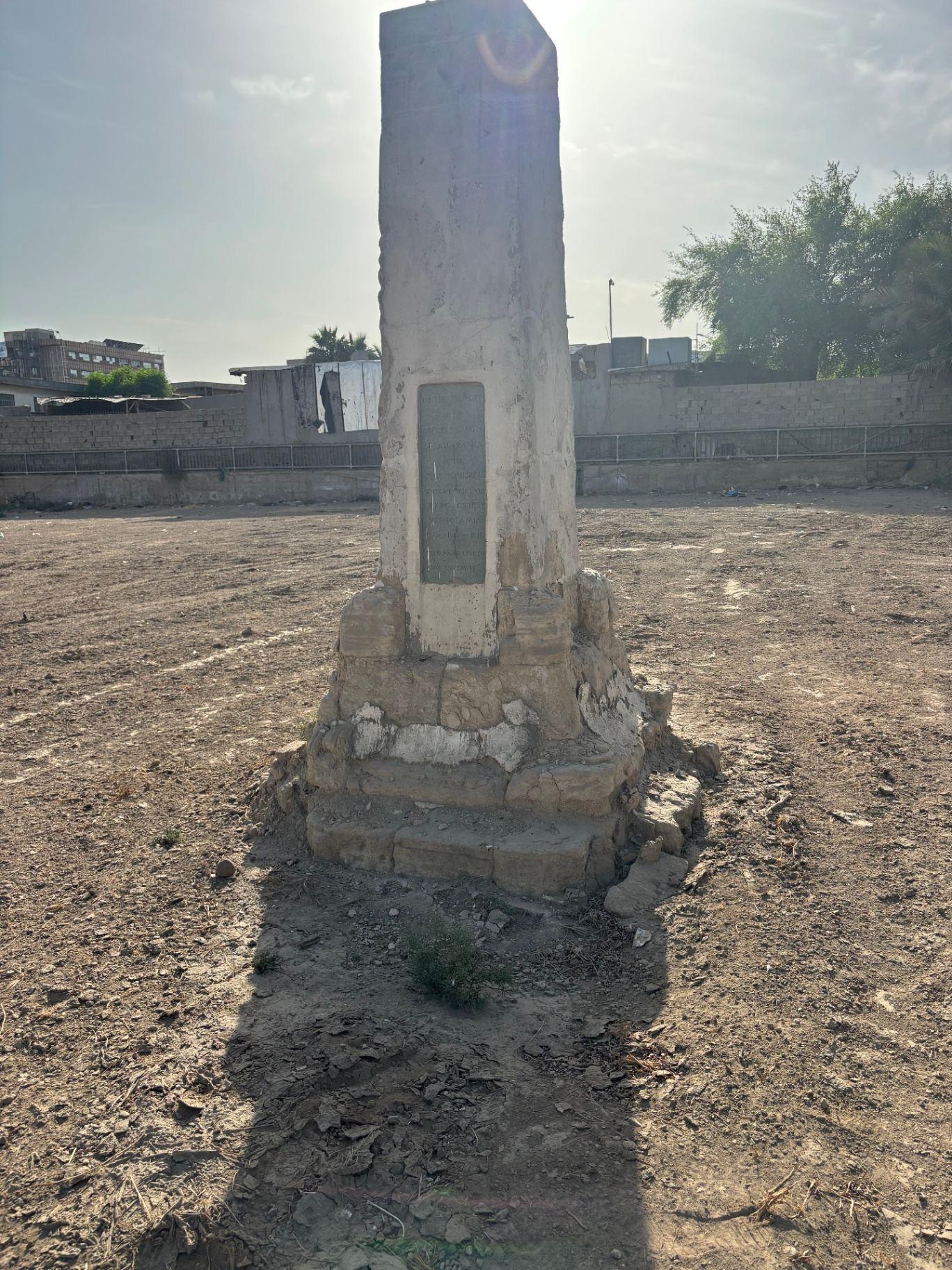 The 13th Division memorial in 2025, standing alone on bare ground in the North East corner of the cemetery. The Samawah Station memorial that once stood behind it is no longer present.